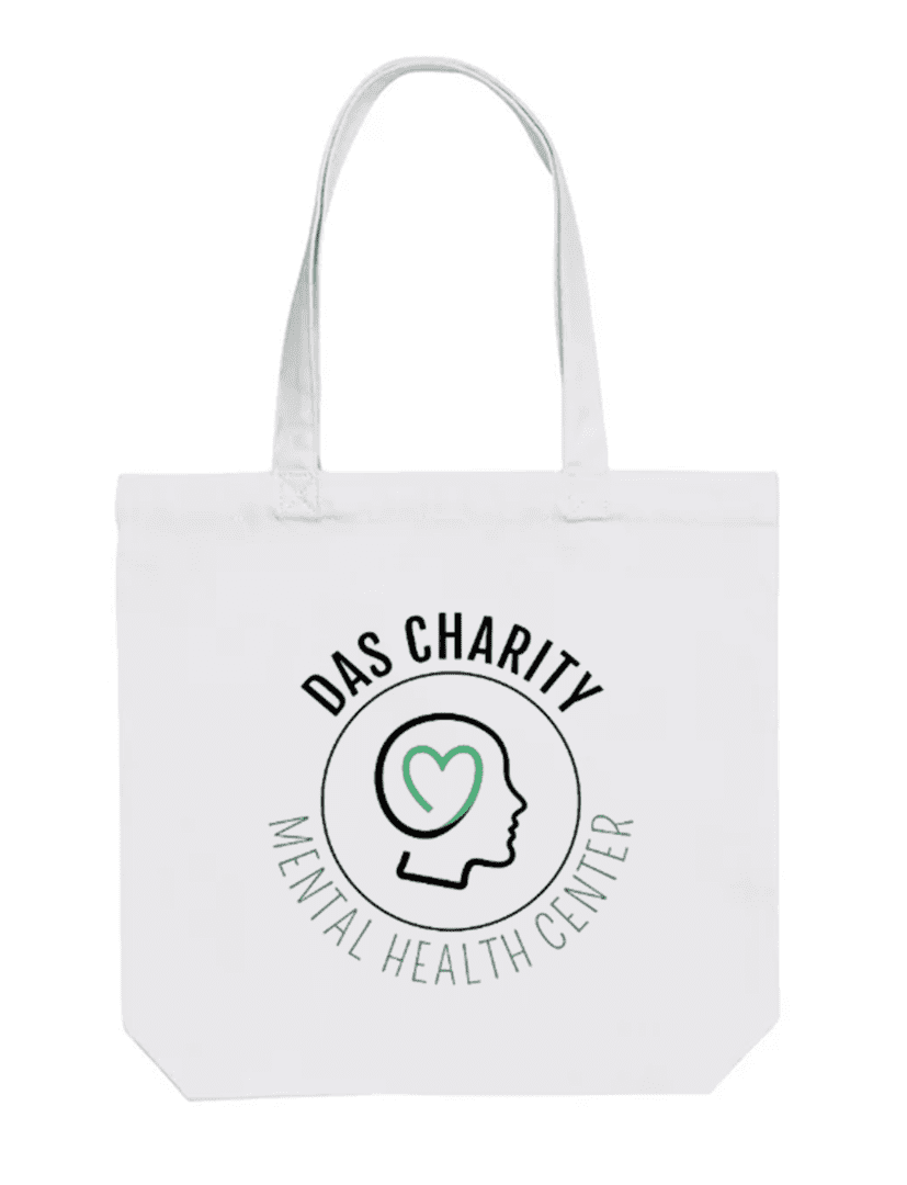 A white bag with the words das charity mental health center on it.